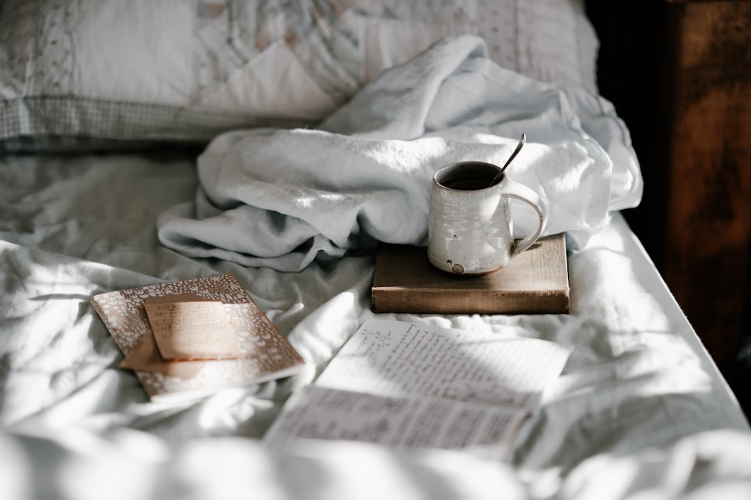 A cozy home setting with soft lighting, a comfortable chair, and calming decor, evoking a sense of relaxation and tranquility.