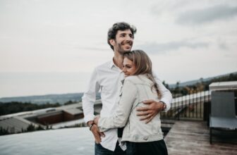 A couple enjoying a cozy moment together, engaged in a meaningful conversation in a warm, inviting setting.
