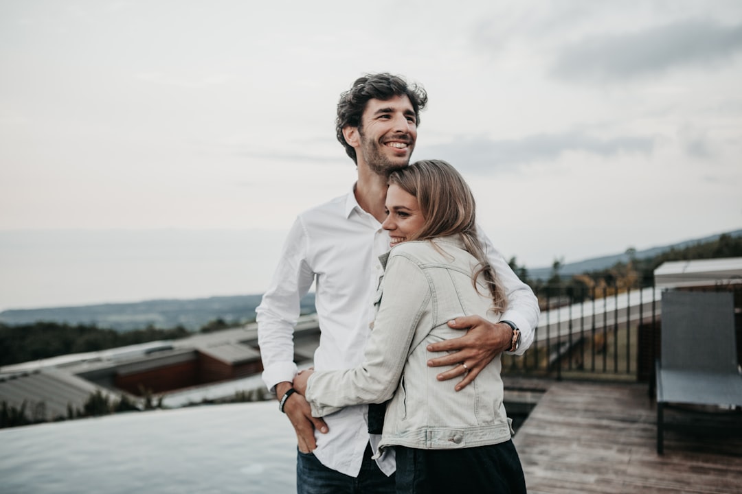 A couple enjoying a cozy moment together, engaged in a meaningful conversation in a warm, inviting setting.